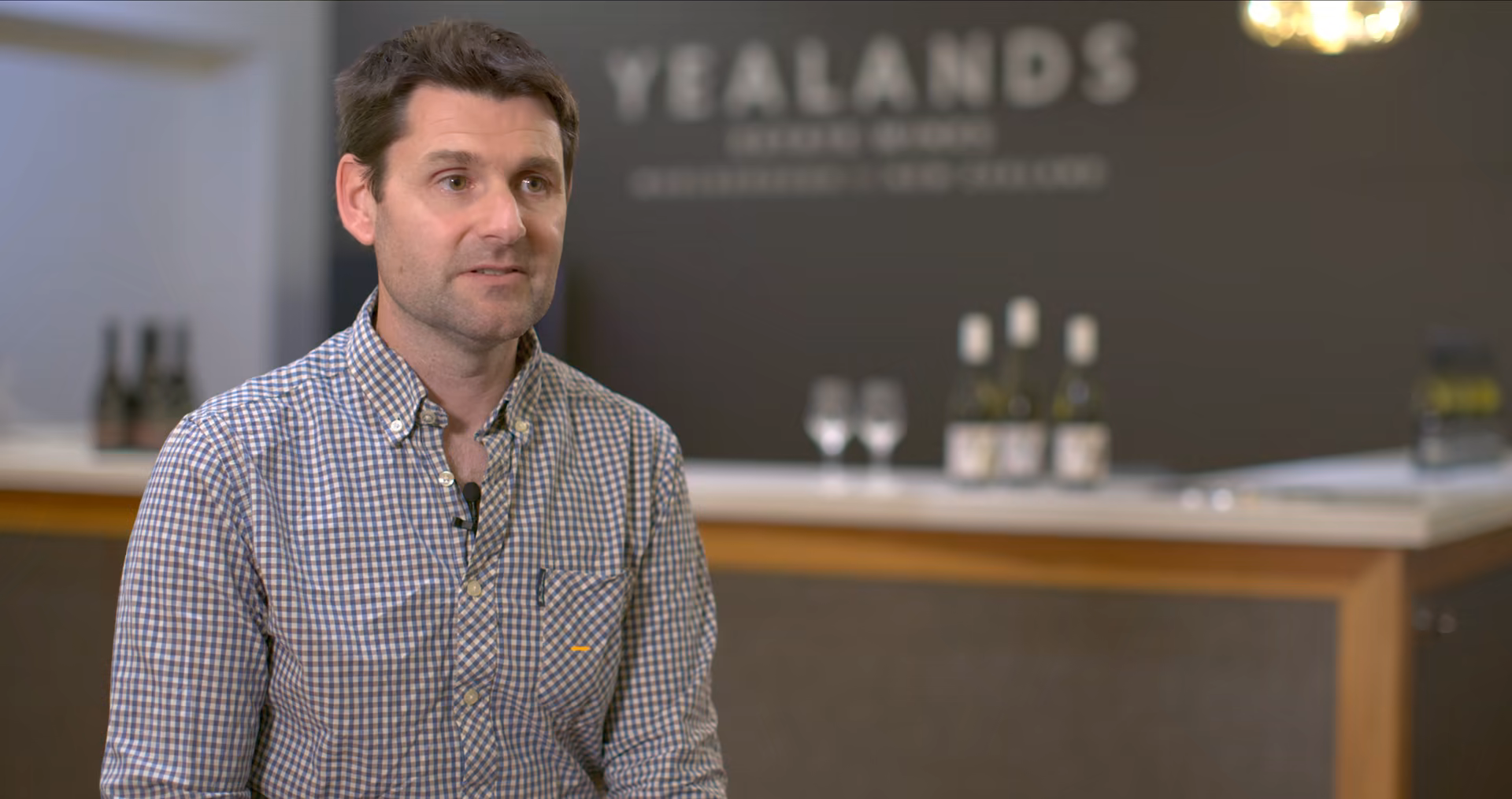Antony Bell of Yealands on camera at the cellar door